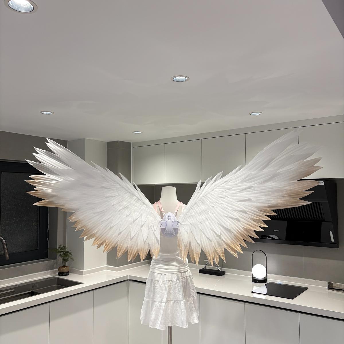 White classic angel wings with gold-colored edges