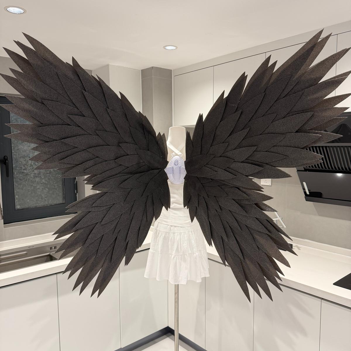Black butterfly-style motorized angel wings