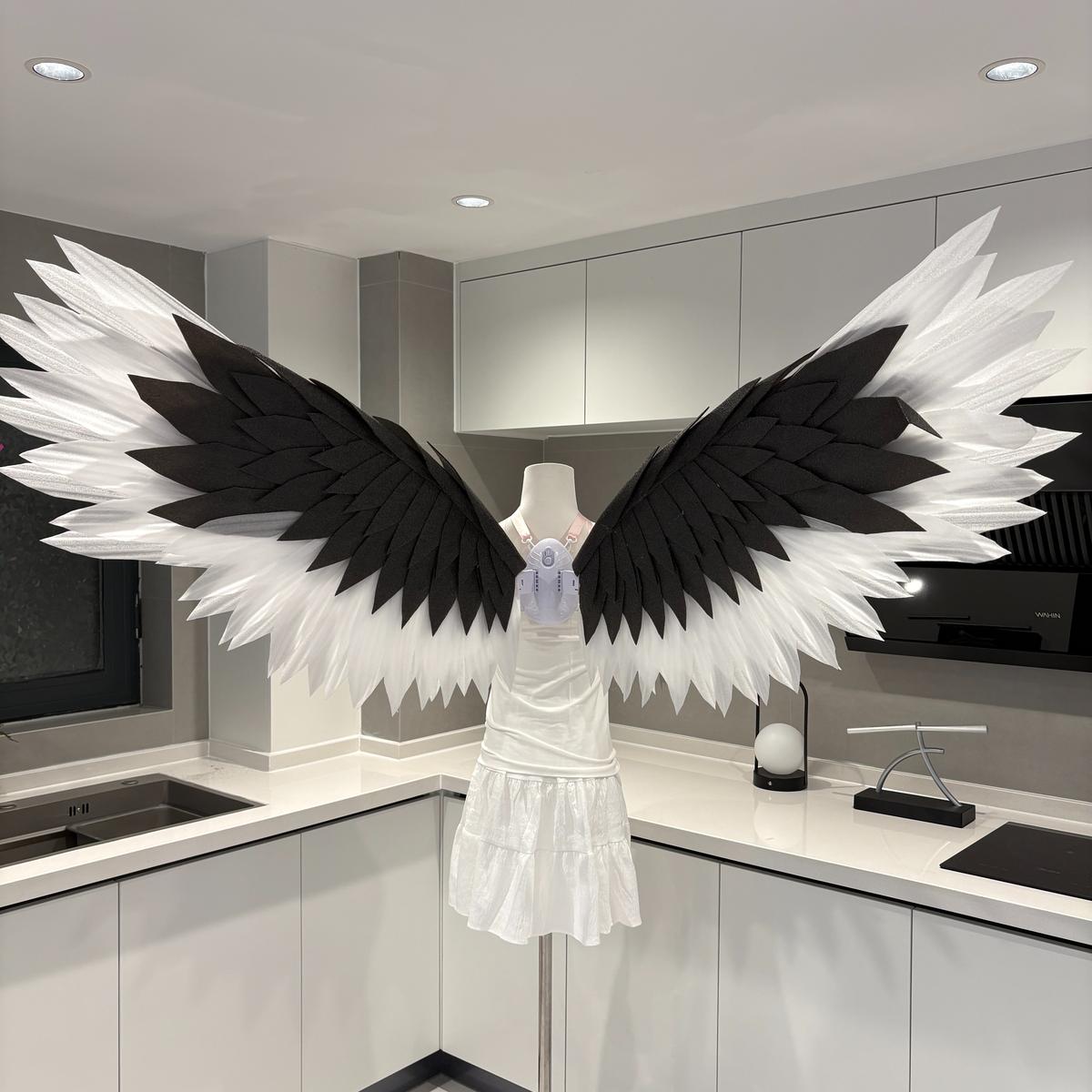 Classic angel wings with black tops and white lower edges