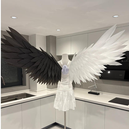 Classic angel wings with one black wing and one white wing