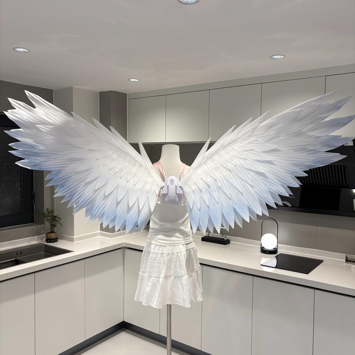 White classic angel wings with blue edges