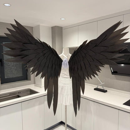 Black swallowtail motorized angel wings spread open