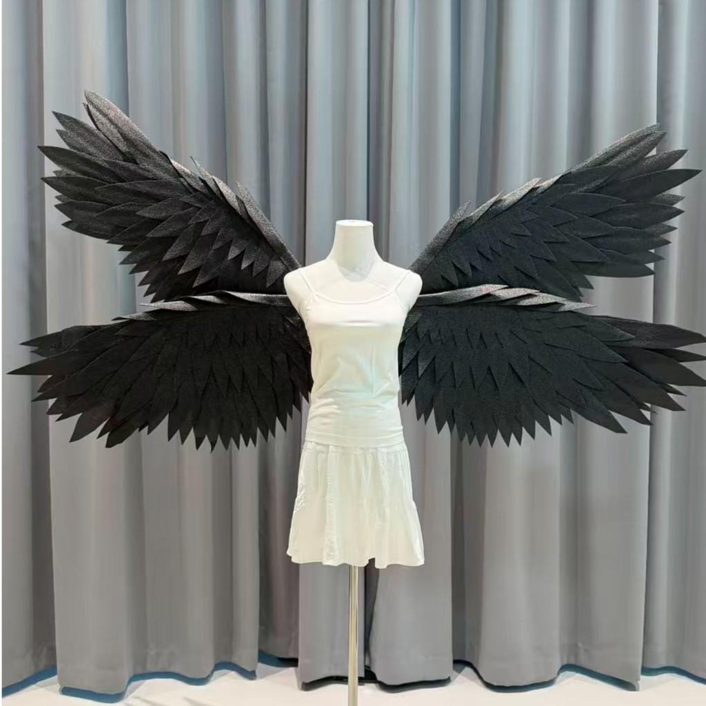Black four-wing motorized angel wings on a mannequin
