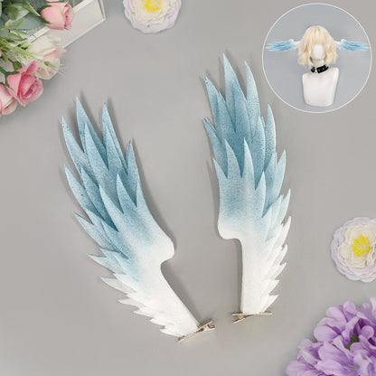 Pair of white and blue angel wing hair clips