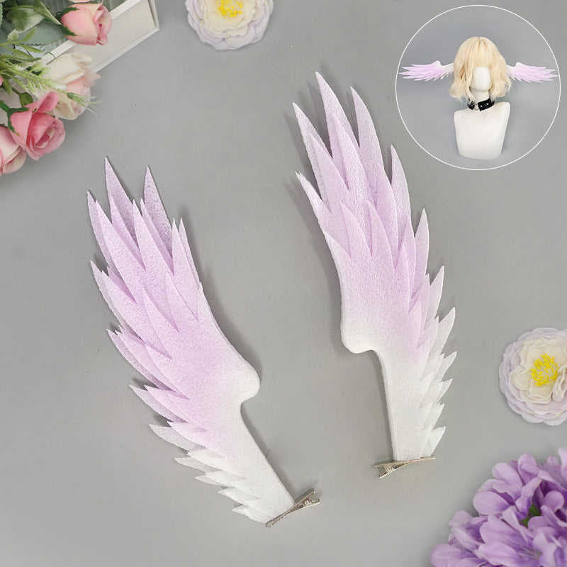 Pair of white and purple angel wing hair clips