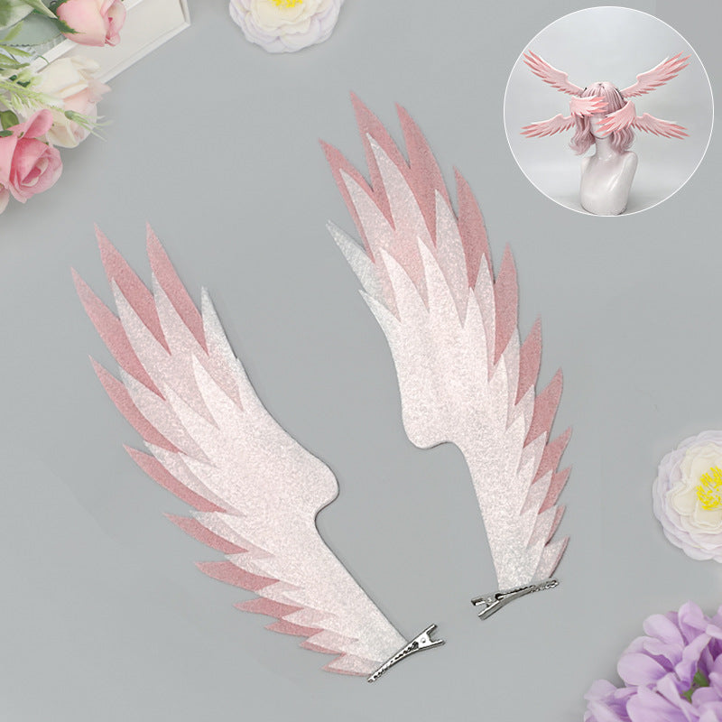 Pair of white and pink angel wing hair clips